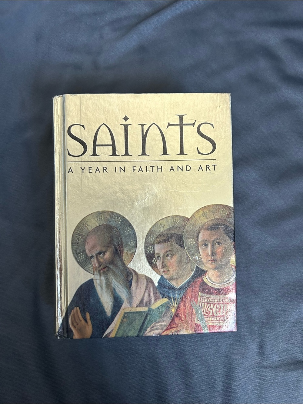Saints: A Year in Faith and Art Hardcover Book - Neutral